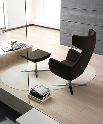 A modern lounge chair where comfort meets geometry, redefining relaxation with style