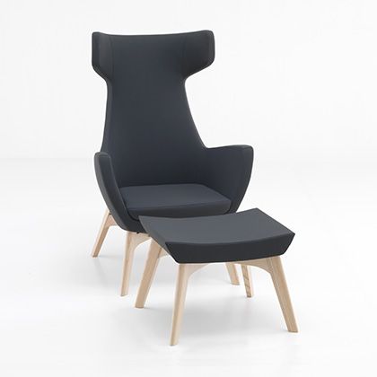 A statement piece for modern interiors, this lounge chair's geometric form exudes sophistication.