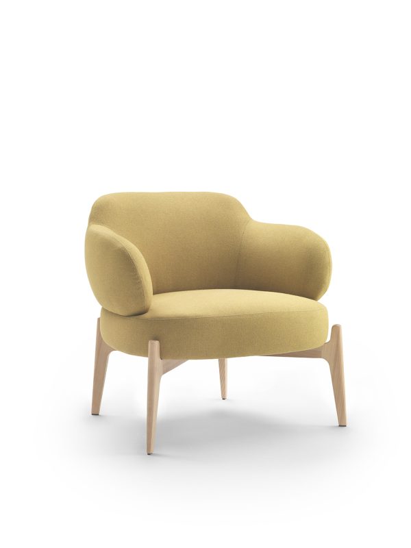 Discover the essence of luxury in our designer armchair, its legs a visual and functional delight.