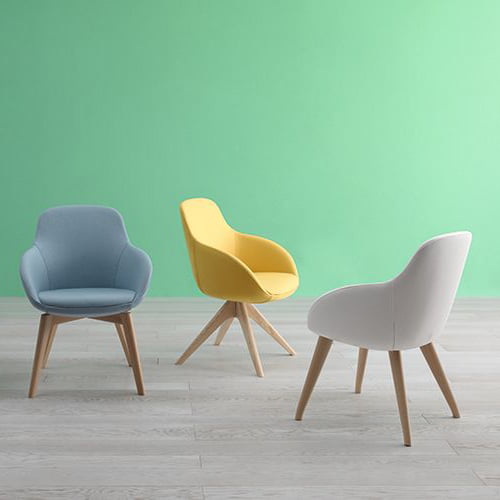Indulge in relaxation with an armchair that merges comfort and design through its rounded lines and sleek leg structure.