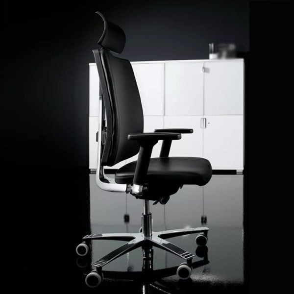 Upholstered office chair with wheelbase, complementing any office decor.