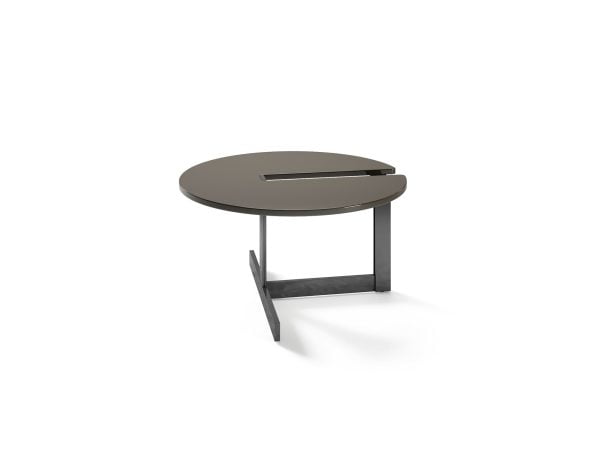 With its unique cut-out design, the Cut-Out Coffee Table adds a touch of contemporary elegance to any living room.