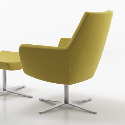 armchair, boasting a striking geometric pattern that makes a statement.
