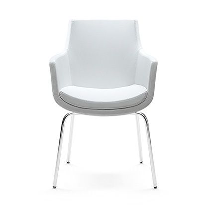 modern armchair, showcasing a distinctive rounded form that exudes elegance.
