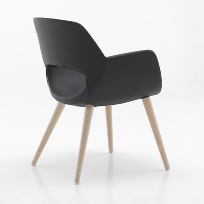 rounded armchair, a fusion of modern design and coziness.