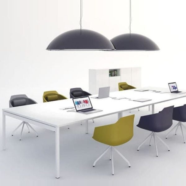 Combining form and function, this modern meeting table showcases a minimalist aesthetic with its sleek lines and slim tabletop