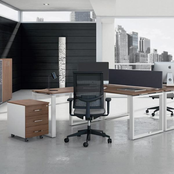 L shaped office desk acompanies a drawer unit