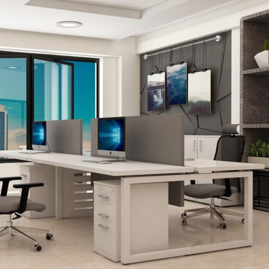 Multi-user office desk setup for enhanced teamwork.