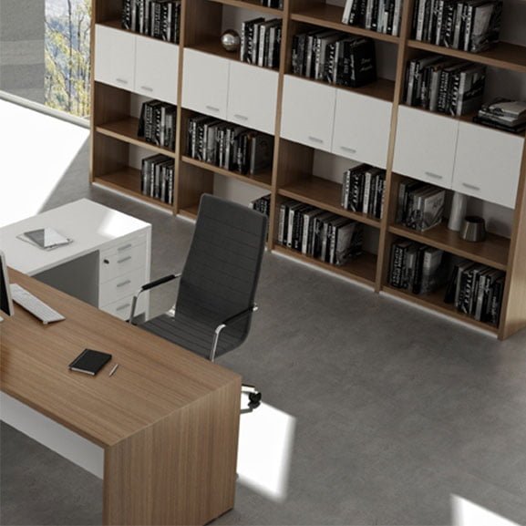 A minimalist office desk designed to create a clutter-free and focused workspace for managers