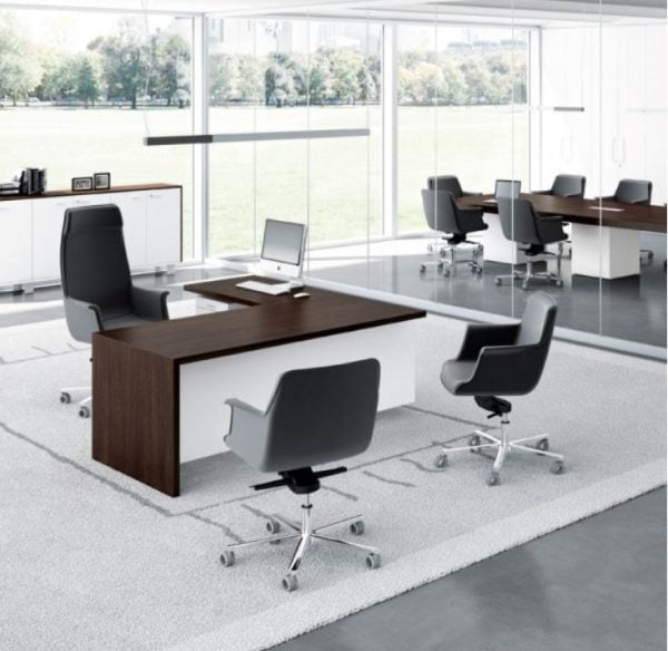 An executive corner office desk, optimizing space and offering a prestigious work area for managers