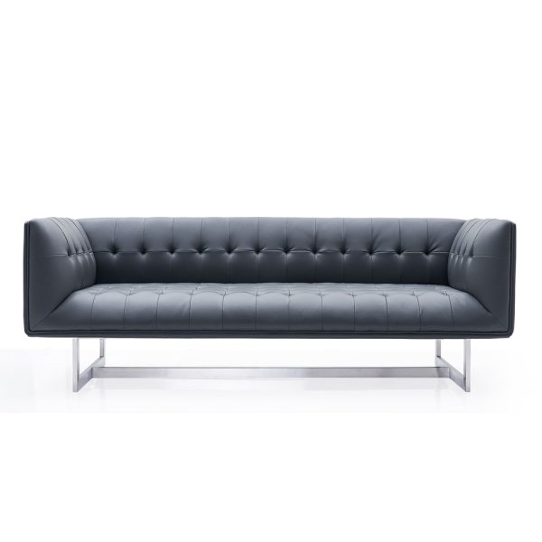 Elevate your space with a modern twist on classic style – our low-back capitone design sofa on sleek metal legs.