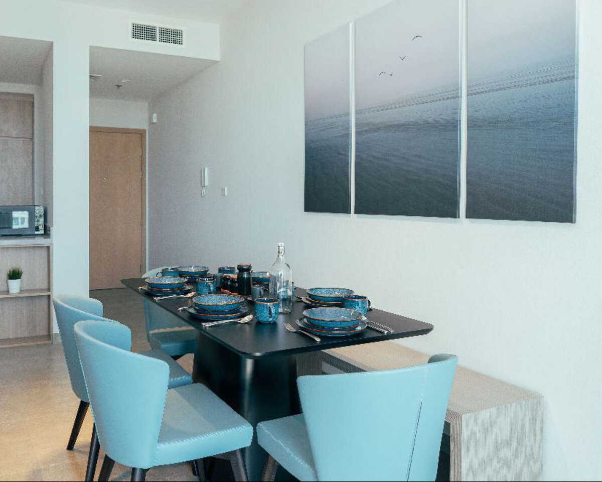 Sophisticated elegance defines the apartment's interior, with luxurious finishes and tasteful accents.