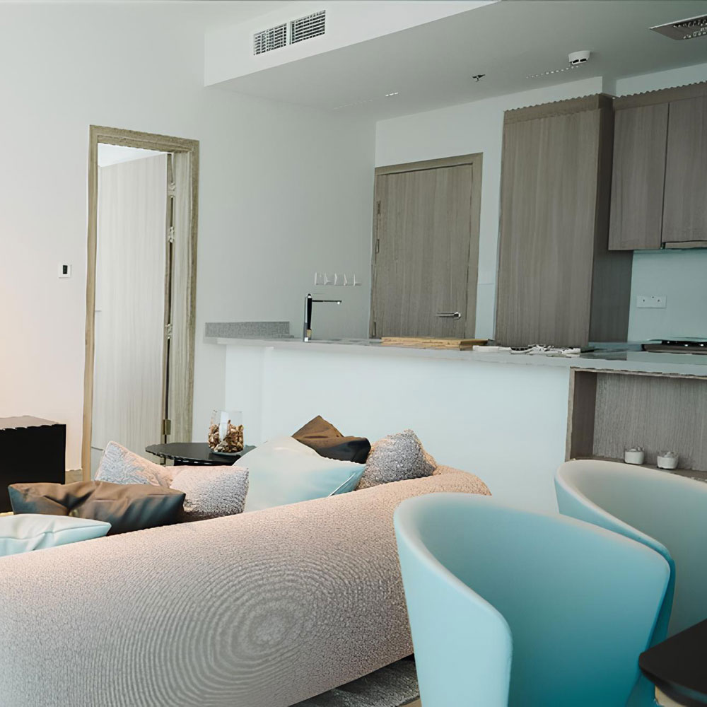 The apartment's design seamlessly blends form and function, providing a stylish yet practical living space.